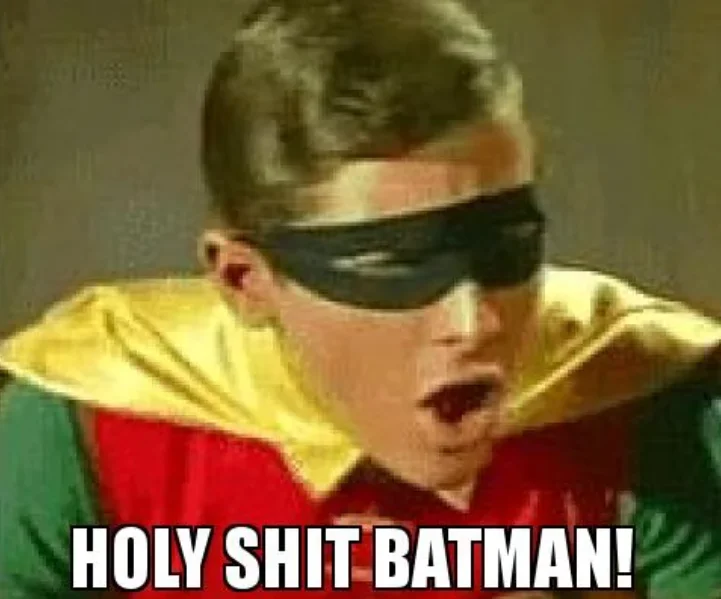 A meme of a shocked Robin from Batman with the text